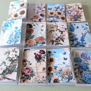 May include: A selection of floral greeting cards with diverse flower designs, such as sunflowers, roses, and hydrangeas. Each card displays a unique arrangement with butterflies and vintage-style backgrounds. The cards are rectangular and arranged in a grid.