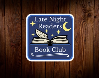 May include: A blue and white sticker with the text "Late Night Readers Book Club" and an illustration of an open book with a crescent moon and stars.