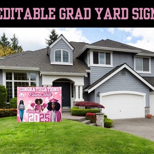 May include: Pink and white graduation yard sign with the text "Congratulations! Elana Hill Class of 2025" and a photo of two girls in graduation caps and gowns.