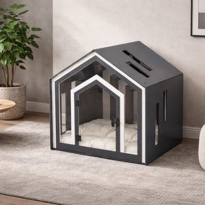 May include: A dark gray pet house with a white-trimmed gabled roof and a matching white-trimmed front door. The structure features vertical rectangular cutouts on the side and a plush, tufted white cushion inside for comfort and rest.