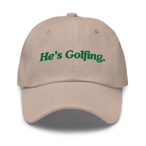 Funny Golf Hat, He’s Golfing Hat, Golf Hat, Golf Gift, Golf Lover Gift, Stocking Stuffer, Birthday Gift, Funny Hat, Dad Gift, Boyfriend Gift