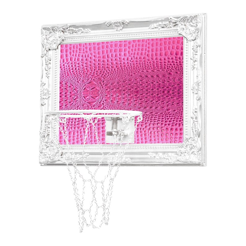 May include: A white ornate frame with a pink crocodile skin pattern surrounds a basketball hoop with a white net.