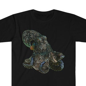 May include: Black t-shirt featuring a detailed illustration of an octopus. The octopus has a mottled pattern in shades of green, blue, and brown. The design is centered on the shirt, showcasing the marine animal's intricate details.