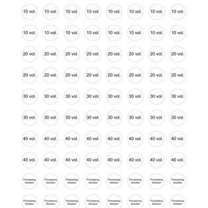 May include: A set of 60 white round stickers with black text. The stickers are arranged in rows and columns. The text on the stickers includes "10 vol.", "20 vol.", "30 vol.", "40 vol.", and "Processing Solution".