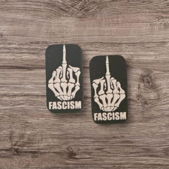 Mirrored skeleton hand f*ck FASCISM beading cabochon cab centers