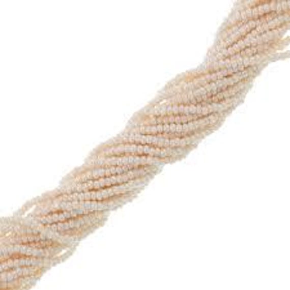 Czech Charlotte Cut Seed Beads – Eggshell Opaque Ceylon 11/0, 12 Strand Hank