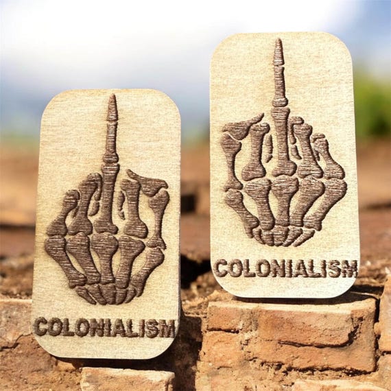 Mirrored skeleton hand f*ck colonialism beading cabochon cab centers