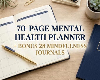 May include: An open planner with the text "70-PAGE MENTAL HEALTH PLANNER + BONUS 28 MINDFULNESS JOURNALS" sits on a wooden desk. A gold pen rests on the open pages. A closed blue journal, a succulent, and a gold paper clip are also visible.