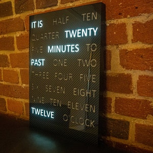 Word Clock. Carbon fiber. Handmade unique timepiece with 100% genuine carbon.