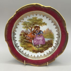 Limoges France Traditional Courting Couple Porcelain Plate with Rouge Border