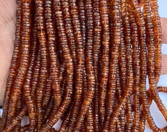 AAA+ Hessonite Garnet Beads: Smooth Tyre Shape, 4-5mm, 13 Inch Strand