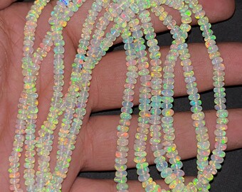 Ethiopian Opal Beads: White Smooth Rondelle, 3-4mm 16 Inch Strand