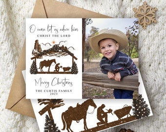 May include: Christmas card with a photo of a child wearing a cowboy hat, and a sepia-toned nativity scene illustration. The card includes the text "O come let us adore him CHRIST THE LORD" and "Merry Christmas THE CURTIS FAMILY 2023".