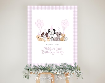 Puede incluir: Un cartel de bienvenida de vichy rosa y blanco con un grupo de perros de dibujos animados que llevan sombreros de fiesta. El cartel dice "Bienvenido a la fiesta de cumpleaños de Millie de 2 años".