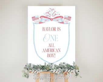 Może przedstawiać: Biały znak z akwarelowym wzorem w kolorze niebieskim i czerwonym. Na znaku widnieje napis "Baylor is One All American Boy!"