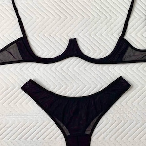 Mesh lingerie set for woman. Bra without cups, underwire, thong panties or open-access thongs