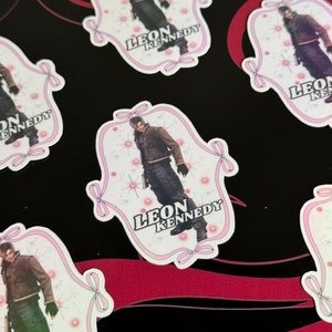 glänzender holografischer Leon Kenny Bogen Vinyl Aufkleber für Laptop, Telefon, Konsolen Geschenk für Gamer re4 re2 Gaming Umbrella corp kawaii