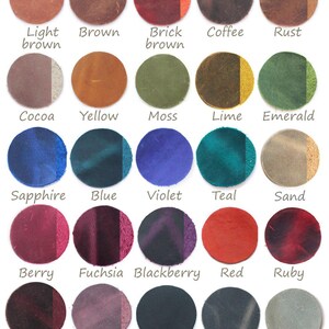 May include: A color chart featuring 25 circular leather swatches. Colors include light brown, brown, brick brown, coffee, rust, cocoa, yellow, moss, lime, emerald, sapphire, blue, violet, teal, sand, berry, fuchsia, blackberry, red, ruby, wine, rose, black, graphite, and silver.