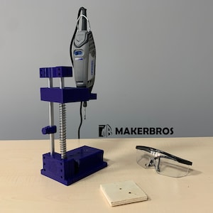 Dispositivo di foratura universale per utensili rotanti / Banco di foratura Dremel