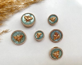 Boutons de décoration, vert clair/turquoise et or avec abeilles, environ 18 mm, 22 mm ou environ 25 mm, pour manteaux, vestes, robes