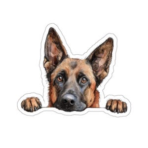 May include: Watercolor sticker of a German Shepherd dog with brown and black fur, large ears, and brown eyes. The dog's paws are visible, resting on a white surface. The sticker has a white border.