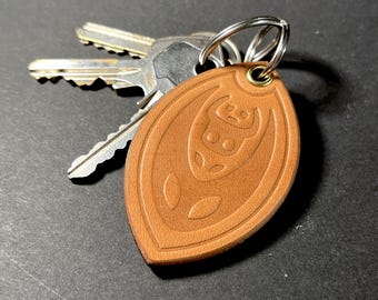 Hollow Knight leather keychain &quot;Masks&quot; - Embossed - With eyelet and keyring