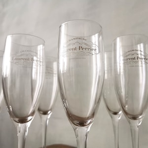 Set van 6 champagnefluiten, gestempeld LAURENT PERRIER