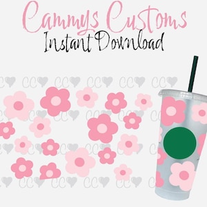 May include: A white reusable cup with a green logo and pink flower designs. The cup has a straw and is surrounded by smaller pink flowers.
