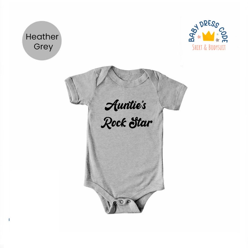 Puede incluir: Body de beb&eacute; gris jaspeado con el texto "Auntie's Rock Star" en negro.