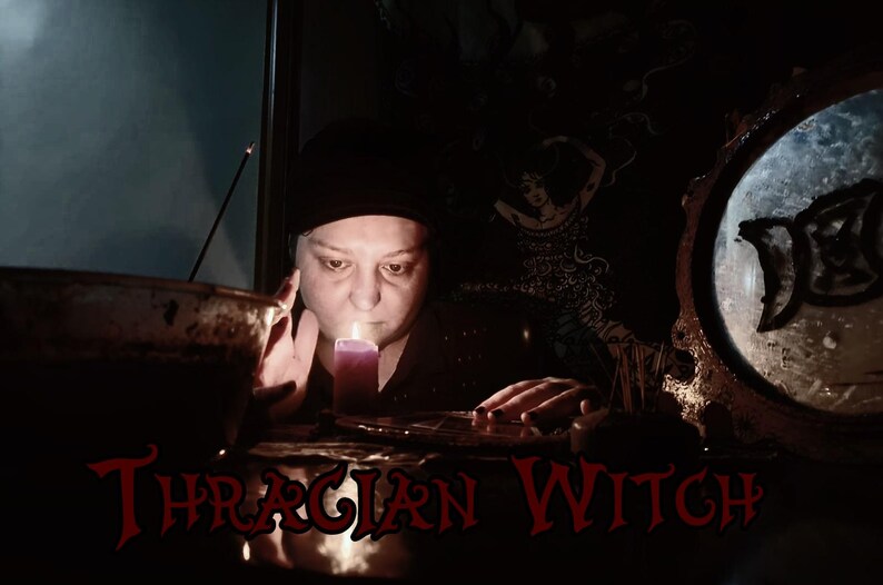 May include: A woman in a dark room with a lit candle, a cauldron, and the text "Thracian Witch" in red letters.