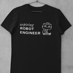Könnte beinhalten: Schwarzes T-Shirt mit einer weißen Umrandung eines Roboters und dem Text "aspiring ROBOT ENGINEER".
