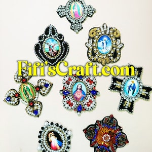 May include: Eight religious-themed embroidered patches with various images of saints and crosses. The patches are decorated with rhinestones and beads in shades of gold, silver, red, blue, and black. The patches are all different sizes and shapes, and they are all surrounded by a white background. The text "Fifi'sCraft.com" is visible in the center of the image.