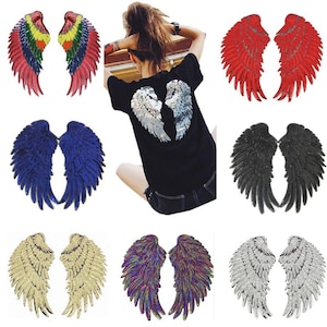 May include: Set of ten iron-on patches featuring angel wings in various colors, including red, blue, gold, silver, and iridescent. The patches are made of sequins and are perfect for adding a touch of sparkle to clothing, bags, or other accessories.
