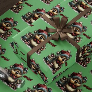 May include: Green wrapping paper with a repeating pattern of a sad-looking hedgehog wearing a Santa hat. A wrapped gift with a brown ribbon and bow is on top of the paper. The word "midad" is printed on the paper.