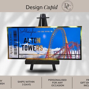 May include: A personalized ticket with gold foil detailing, featuring the text "Aleigha, you are going to Alton Towers." The ticket has a blue background with a roller coaster image. The ticket is displayed on a small black easel.