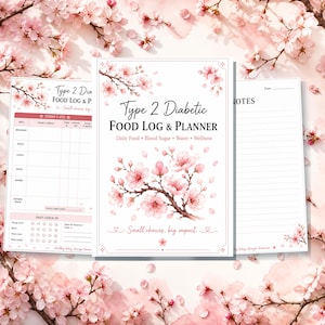 May include: A Type 2 Diabetic Food Log & Planner with a white cover featuring pink cherry blossom illustrations and the text "Small choices, big impact." The planner includes interior pages for tracking daily food, blood sugar, water, and wellness.