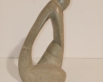 Carved Stone Thinker Statue