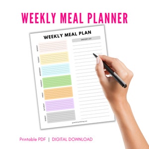 May include: A printable weekly meal planner with a grocery list section. The planner has a colorful design with a different color for each day of the week. The text "WEEKLY MEAL PLANNER" is at the top of the page.