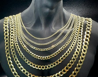 May include: A set of seven gold chain necklaces of varying widths, displayed on a black mannequin bust. The chains are all made of a classic curb link style.