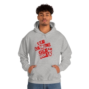 May include: A grey hooded sweatshirt with a red graphic print that says "SEND LAWYERS GUNS AND MONEY".