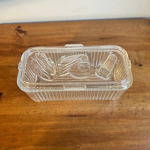 Vintage Federal Glass refrigerator dish with lid, 8” ribbed clear glass refrigerator dish with vegetable motif, 1940s