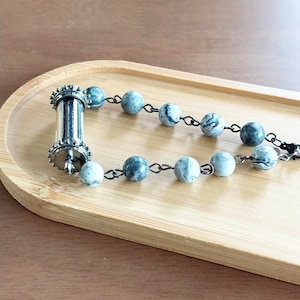 Talisman bracelet, Lucky howlite stone bracelet with Thai Yant 5 rows pendant.