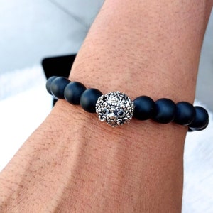 Charm with a bracelet Matt Black Onyx, Thao Wessuwanno pendant bracelet, Amulet bracelet, Matt Black Onyx bracelet.
