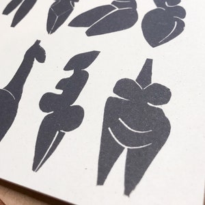 8 prehistoric goddess on a greeting card, all shapes and size