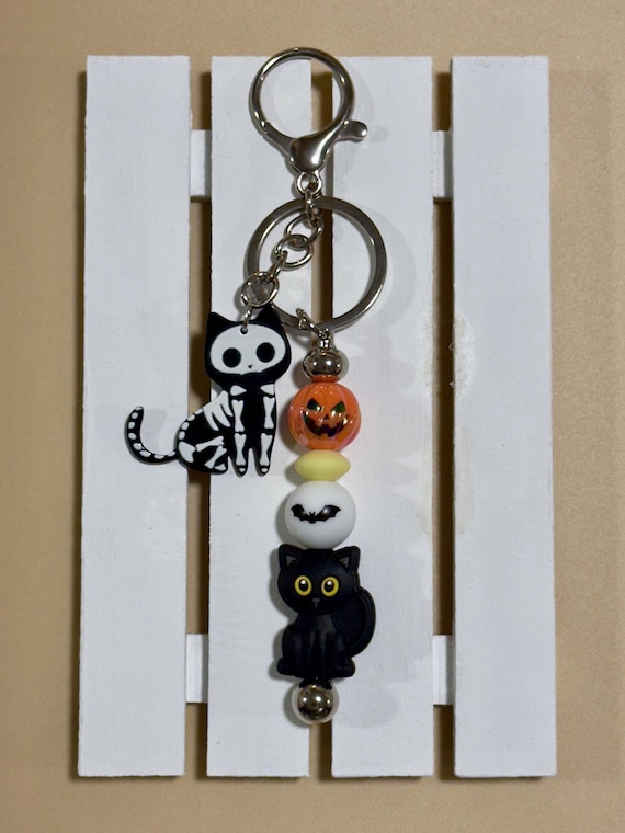 Spooky Halloween Keychain: Cat, Pumpkin, and Skeleton Charms