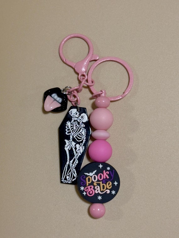 Spooky Babe Pastel Pink Halloween Keychain – Skeleton Charm with Beaded Accent