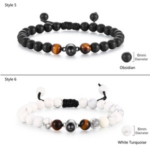 Pu&ograve; includere: Due stili di braccialetti con perline, con un cordoncino nero e un ciondolo d'argento. Lo stile 5 presenta perline di ossidiana nera e lo stile 6 presenta perline di turchese bianco. Entrambi gli stili includono perline di occhio di tigre e un ciondolo di 6 mm di diametro.