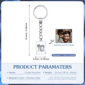 May include: A silver keychain with a square crystal charm that can be customized with a 2D photo. The charm measures 2 inches by 0.79 inches and the keychain is 10.4 inches long. The keychain is made of crystal and stainless steel and weighs 0.90 ounces.