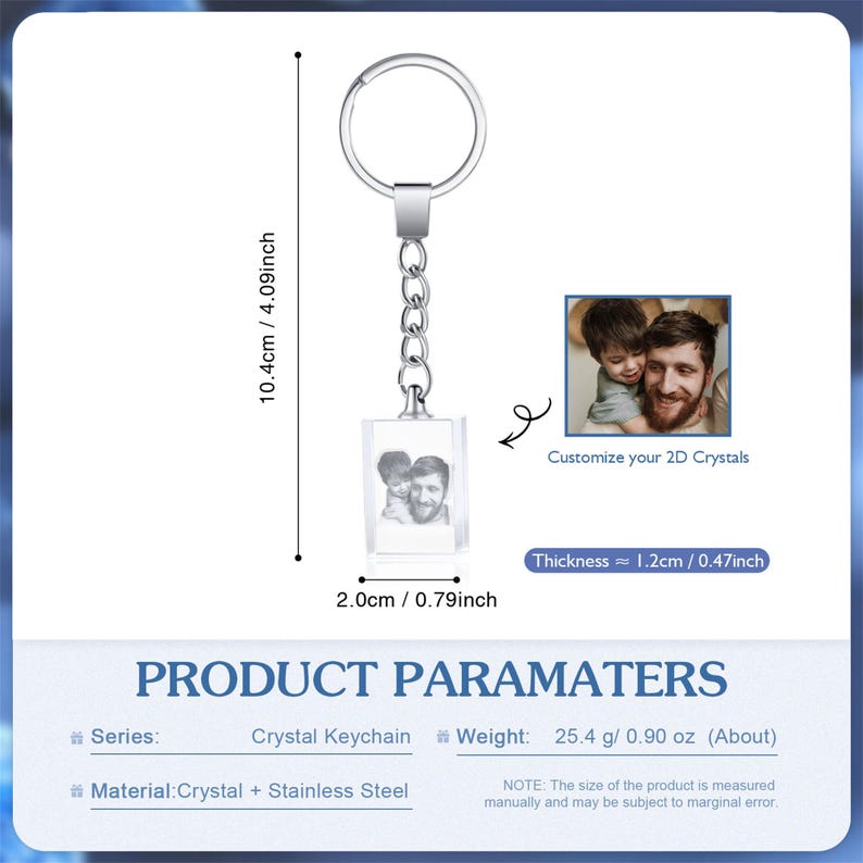 May include: A silver keychain with a square crystal charm that can be customized with a 2D photo. The charm measures 2 inches by 0.79 inches and the keychain is 10.4 inches long. The keychain is made of crystal and stainless steel and weighs 0.90 ounces.