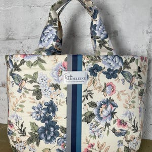 Bolso de mano Emile con flores azules